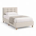 Lit simple capitonné beige en polyester avec pieds en bois massif 90 x 190 cm